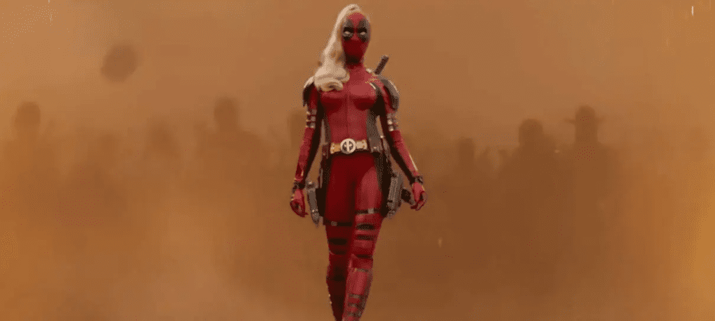 Imagem de uma mulher vestindo o clássico uniforme do Deadpool, com um rabo de cavalo loiro caindo pelo ombro direito.